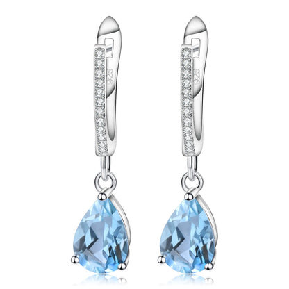 Set of three sterling silver drop earrings with pear-shaped stones in blue, navy, and violet, accented with pavé-set crystals