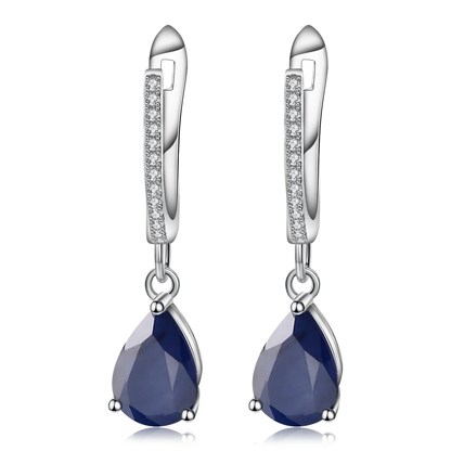 Set of three sterling silver drop earrings with pear-shaped stones in blue, navy, and violet, accented with pavé-set crystals