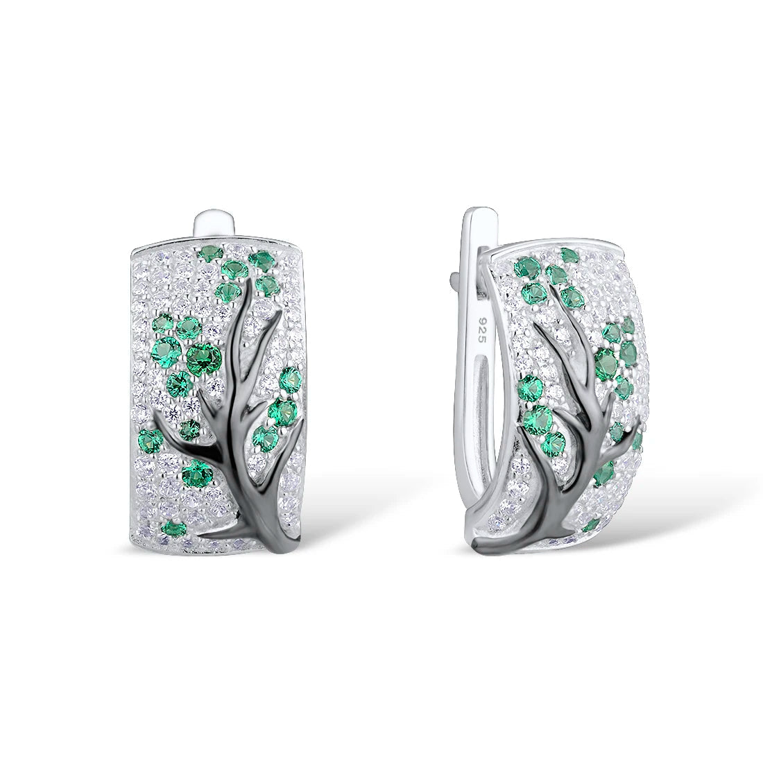 Silver earrings with raised black tree branches and scattered green and white stones

