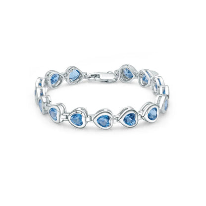 Silver bracelet with heart-shaped blue stones in a linked design

