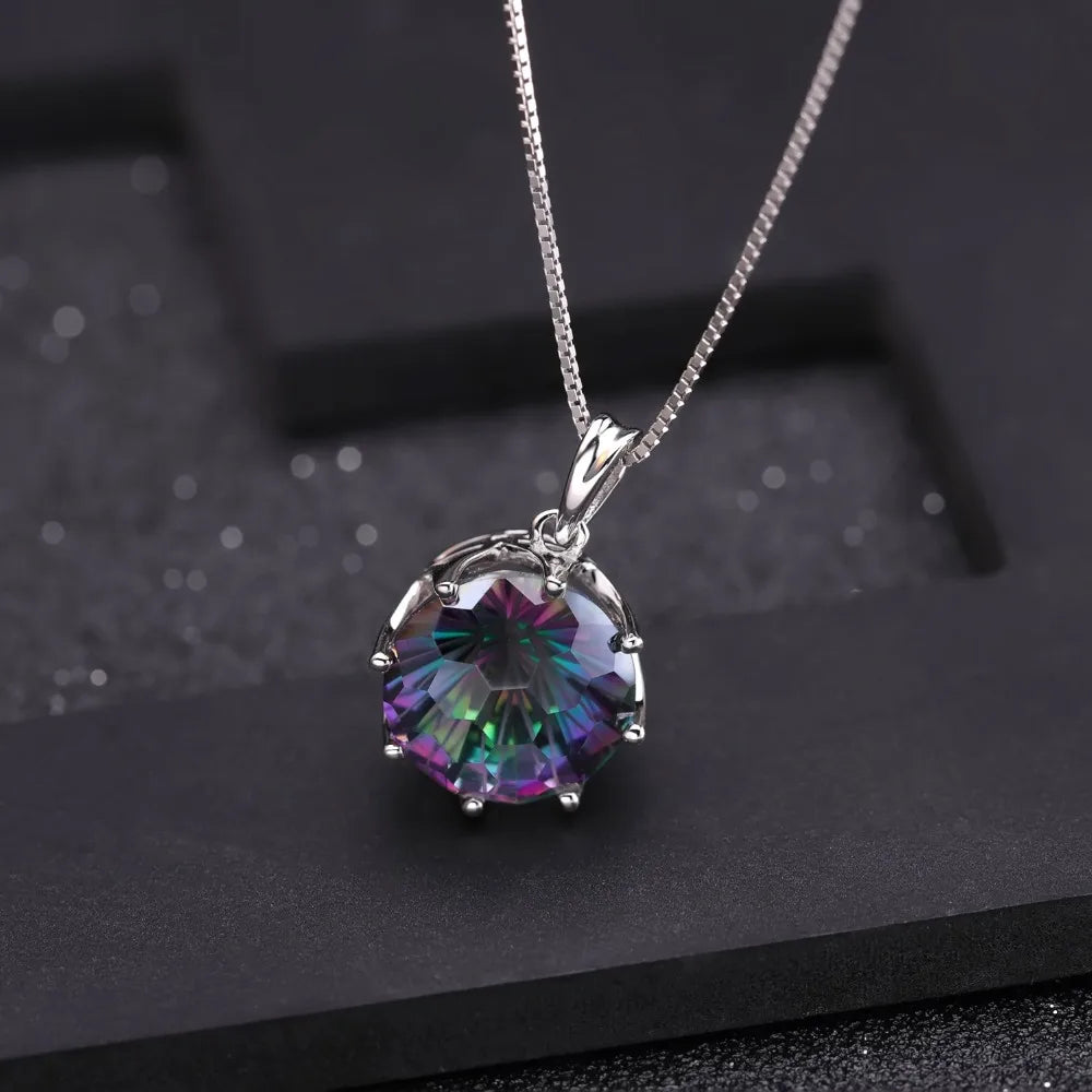 Silver pendant with a round multicoloured quartz stone in a scalloped prong setting

