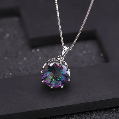 Silver pendant with a round multicoloured quartz stone in a scalloped prong setting

