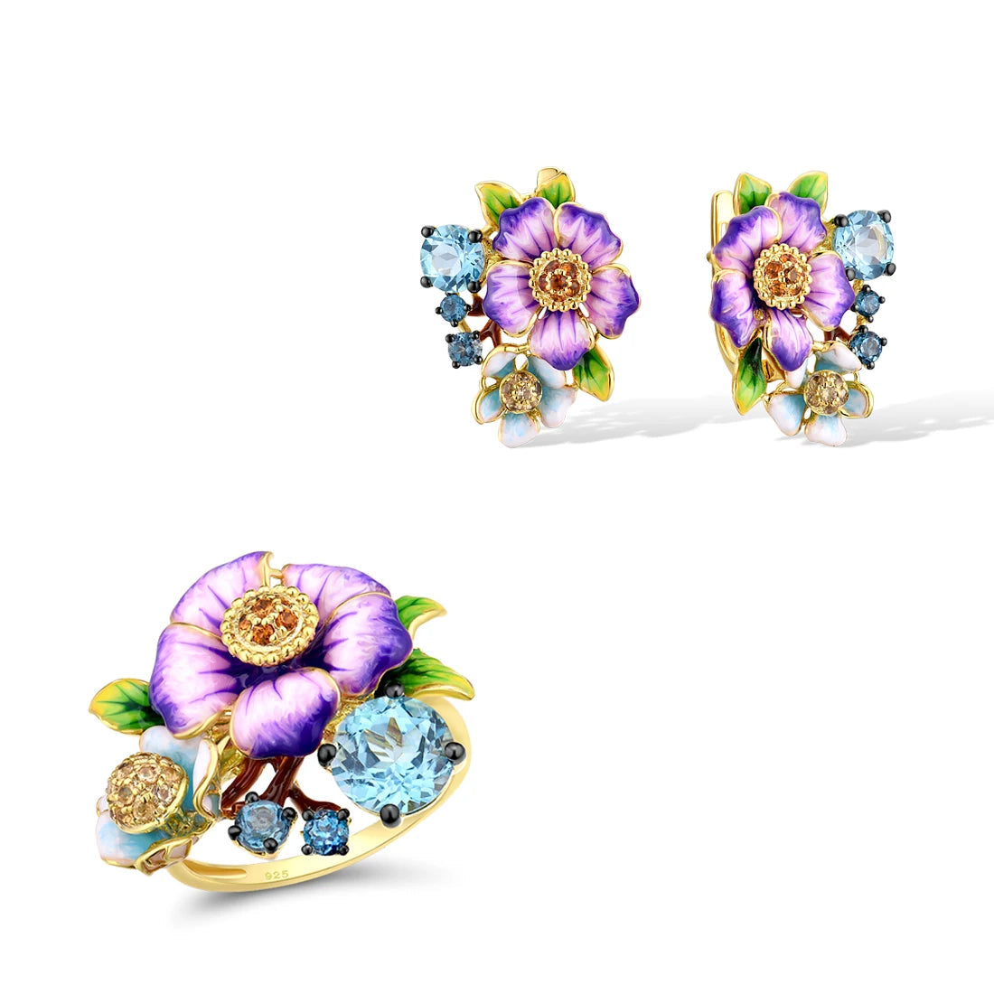 Colorful floral jewelry set featuring purple aquilegia flowers with green leaves, blue stones, and gold-tone detailing

