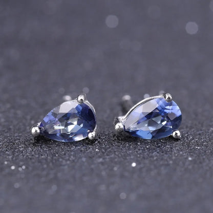 Silver stud earrings with deep blue teardrop-shaped quartz stones

