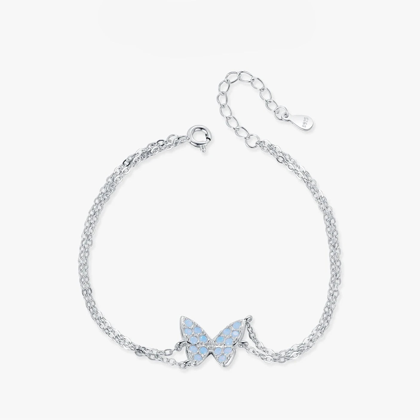 Delicate silver bracelet with a central opal butterfly charm and fine double chain

