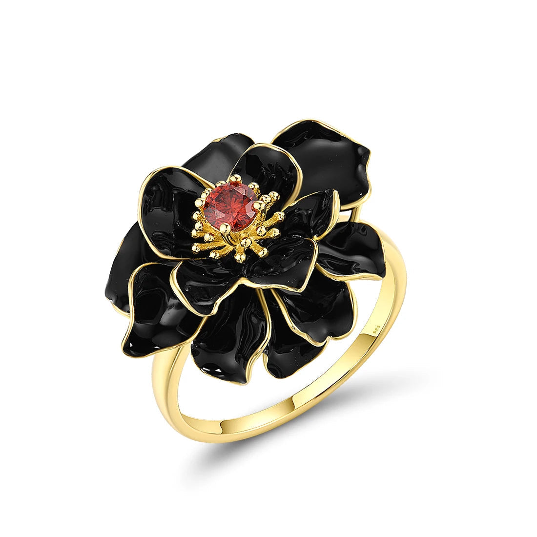 Gold ring with layered black enamel flower petals and a red gemstone at the center.
