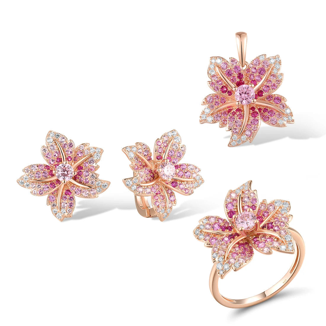 Giglio Rosa jewelry set featuring flower-shaped rose gold pieces with pink and white pavé stones, including ring, earrings, and pendant.

