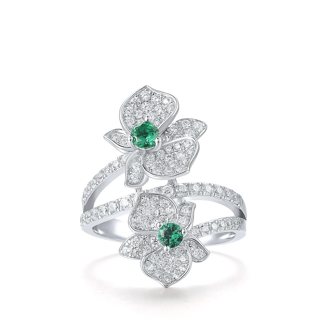 Sterling silver ring with twin pavé-set floral forms and vivid green center stones


