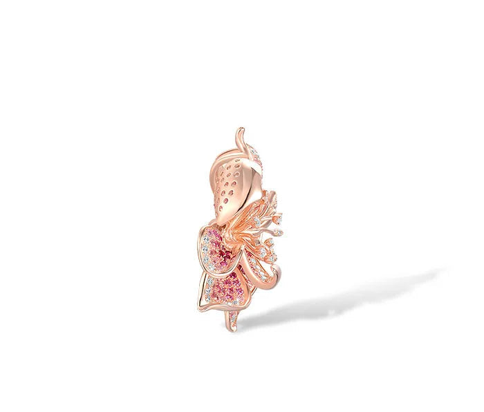 Fragola jewelry set featuring pink and violet pavé stones in rose gold flower designs including ring, earrings, and pendant.

