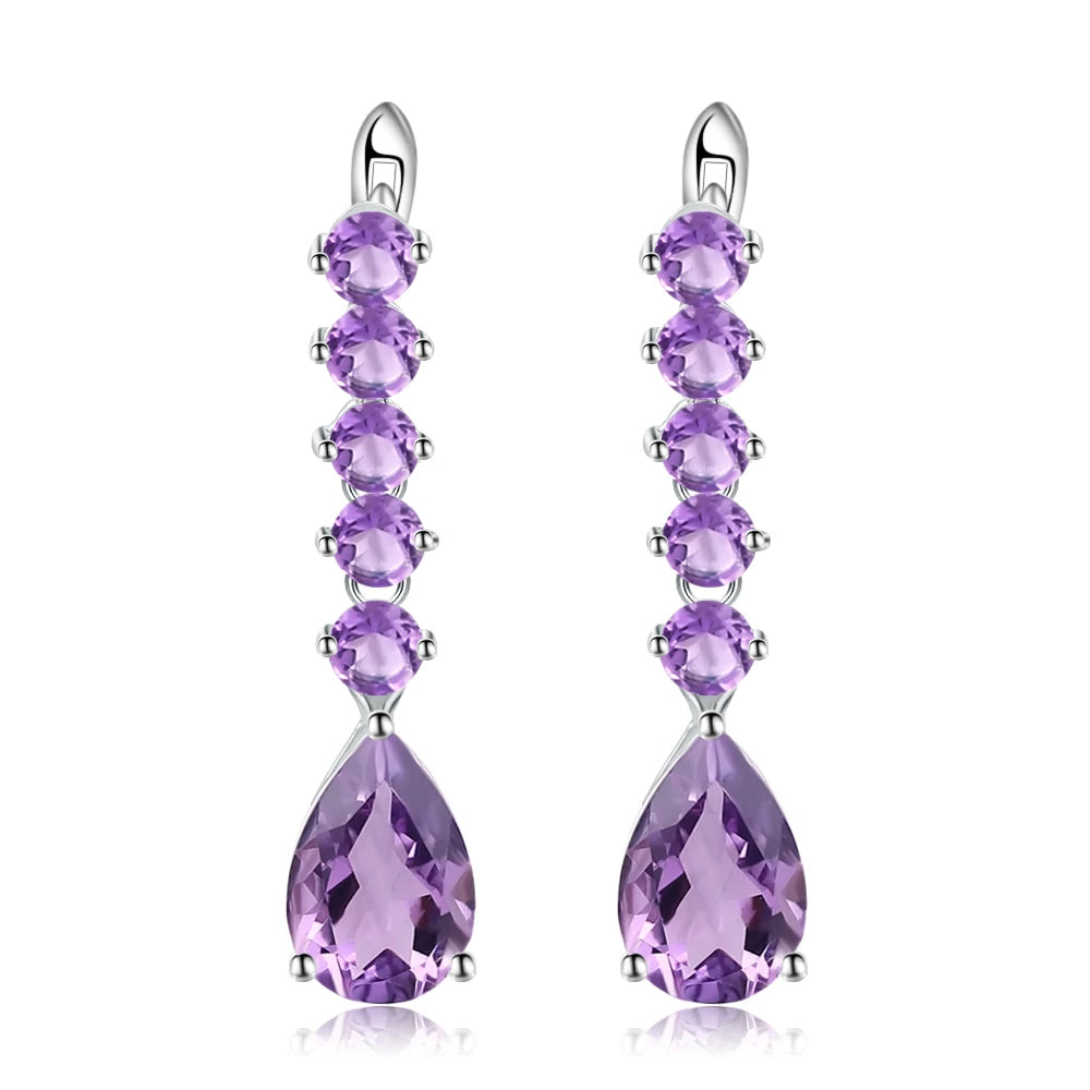 Sterling silver drop earrings with a vertical line of round amethyst stones and teardrop-shaped violet gemstones

