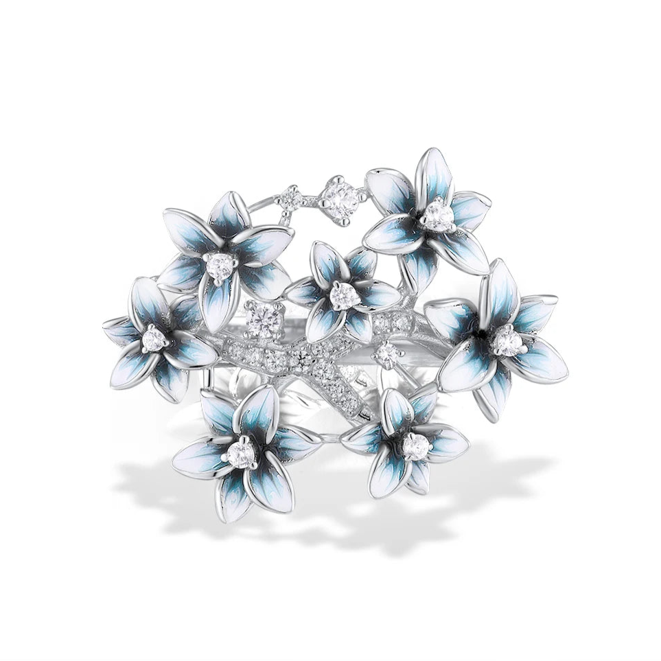 Silver ring with blue and white enamel hydrangea flowers and sparkling stones


