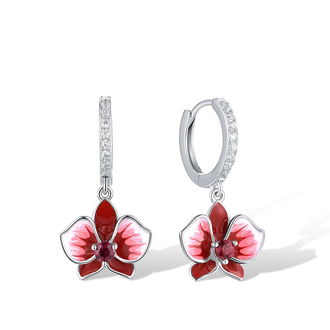 Cuore Rubino earrings featuring red and pink orchid-shaped enamel flowers with sparkling red gemstone centers and crystal-accented hoops.


