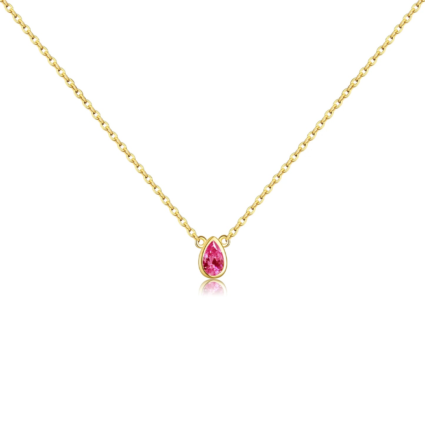 Gold necklace with a pear-shaped pink gemstone pendant at the center.

