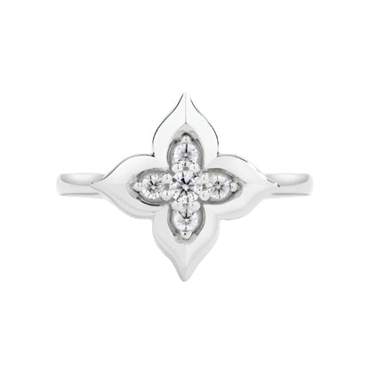 Moissanite floral ring in white gold and yellow gold plating, shown on hand and styled in various settings