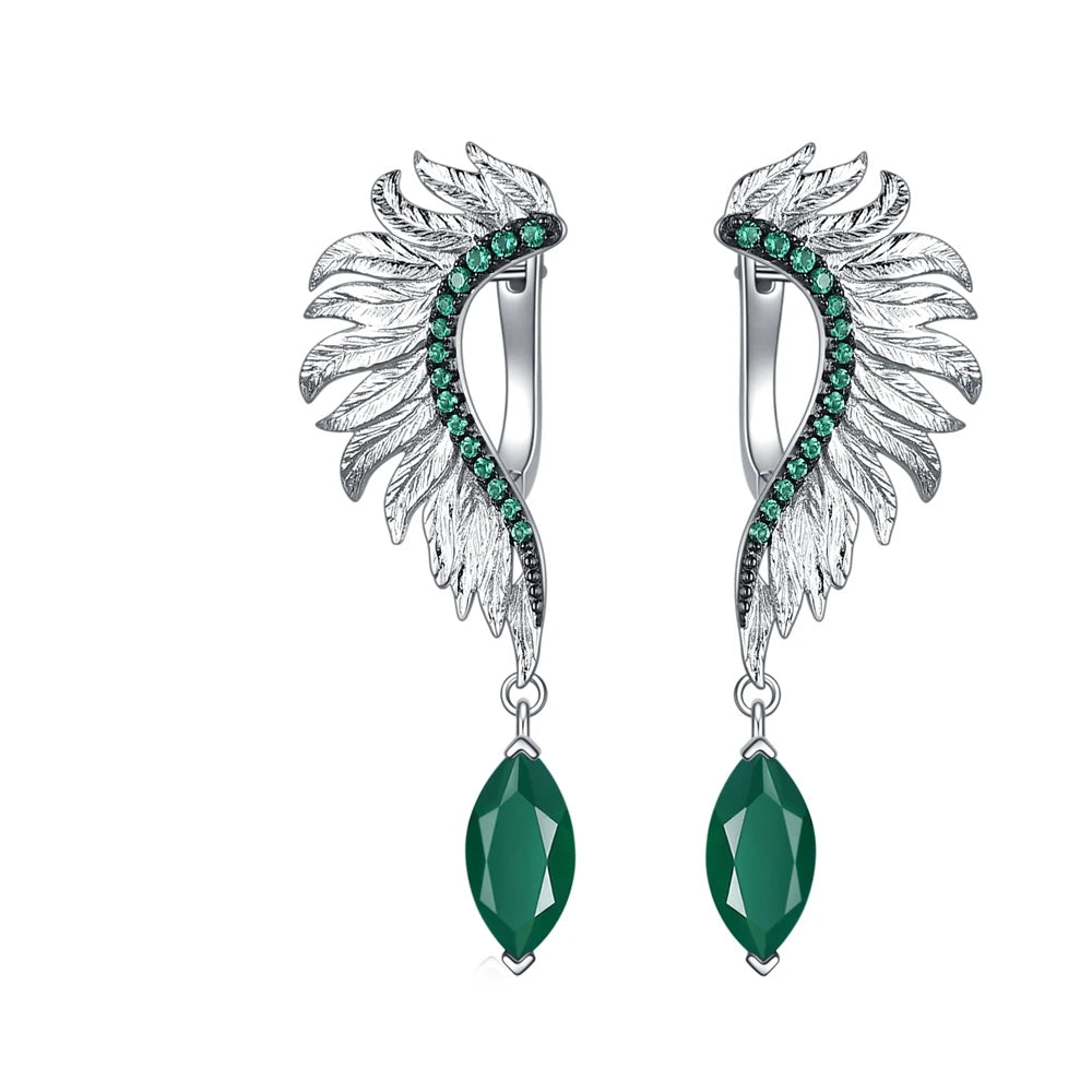 Silver earrings with feather-like design, green gemstones, and marquise green dangles

