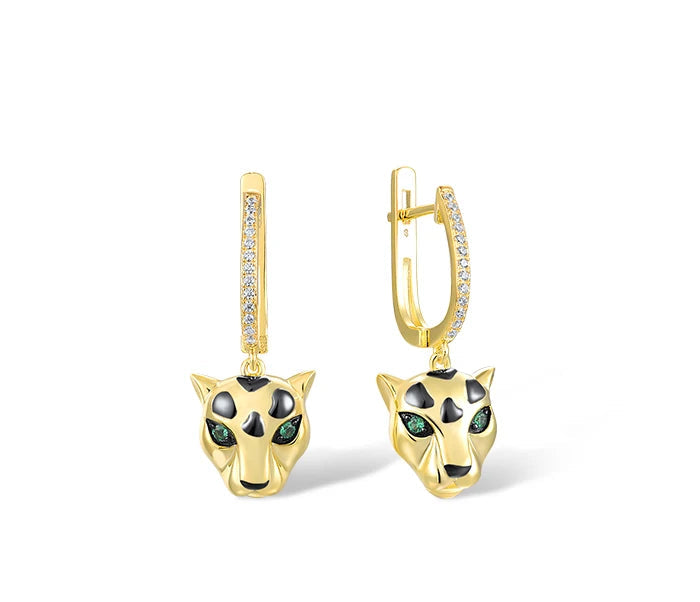 Gold jewelry set featuring panther heads with black spots and green eyes, including earrings, pendant, and ring


