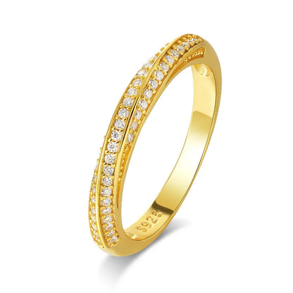 Slim silver ring featuring two parallel rows of small white stones, forming a subtle twist in the center, from the Bianco Nero collection.

