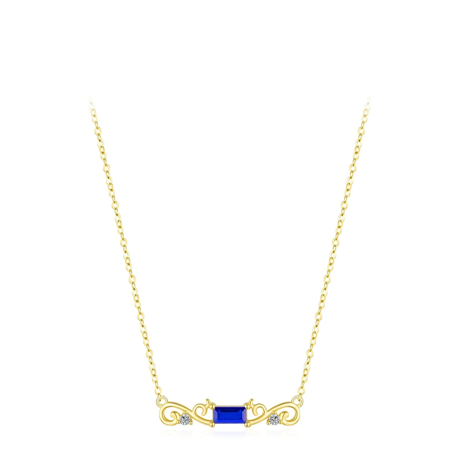 Gold necklace with a central rectangular deep blue gemstone flanked by scroll-like gold accents and small clear crystals