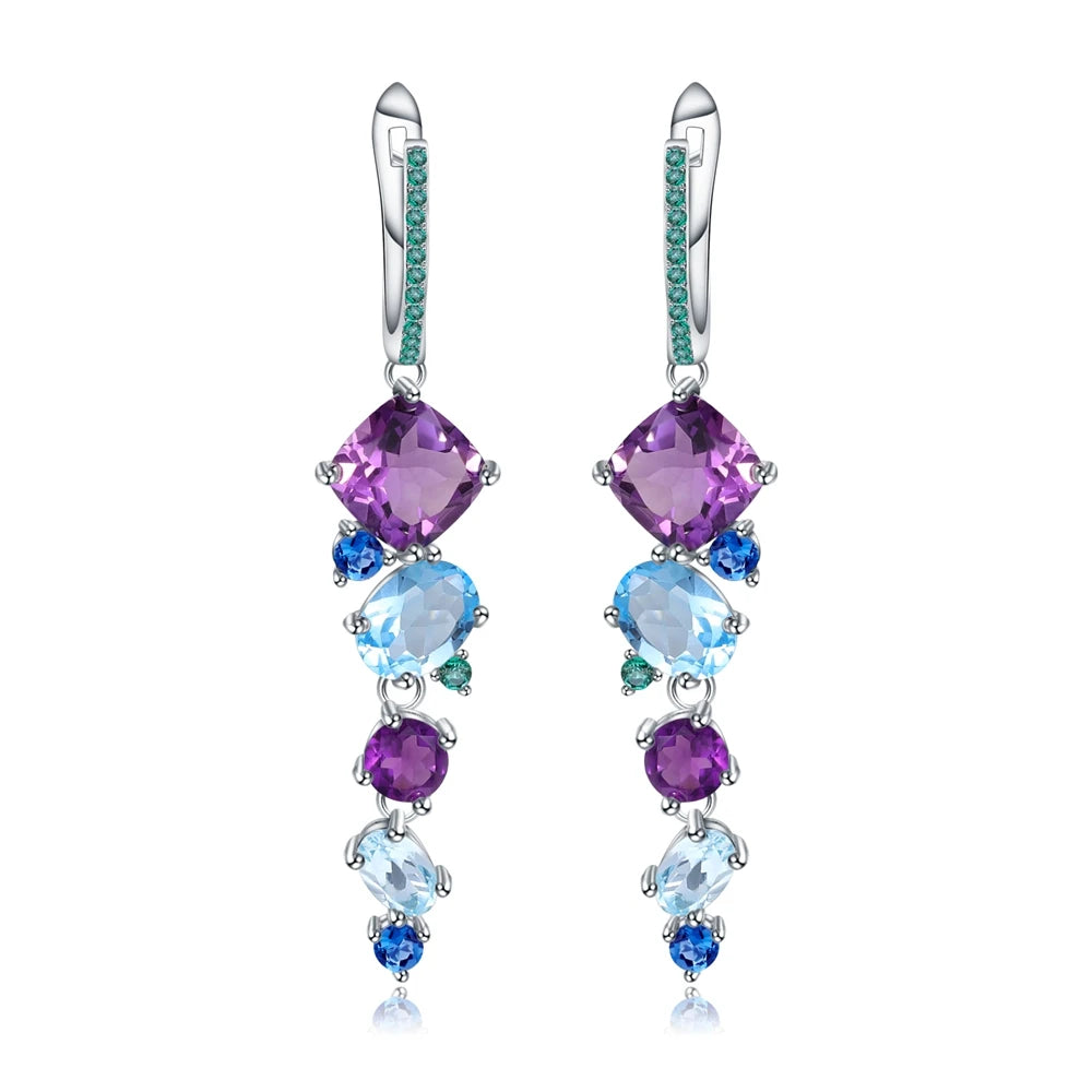Dangling earrings with gradient blue and green stones set in silver

