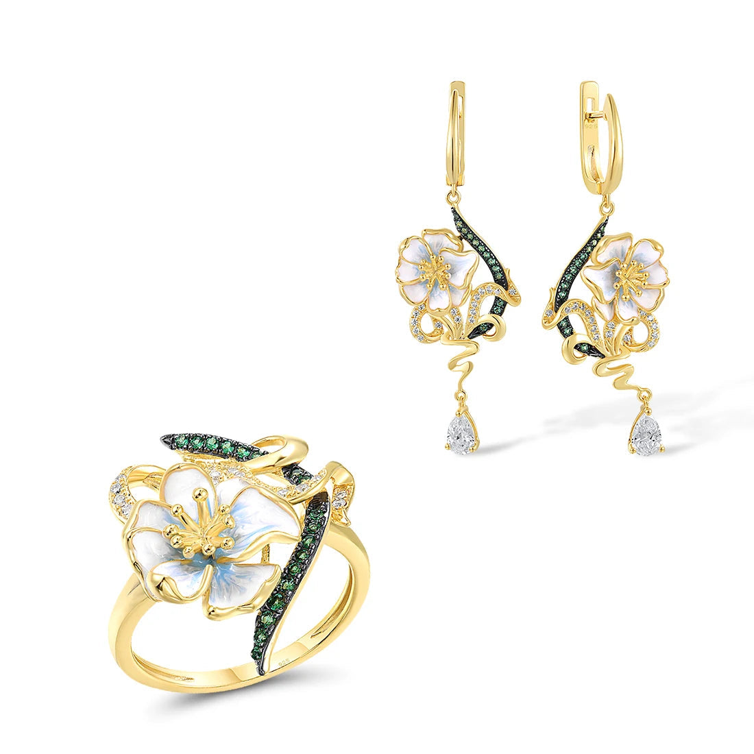 Nastro Verde jewelry set with green-accented gold-tone earrings and ring featuring delicate white flowers from the Verde collection.

