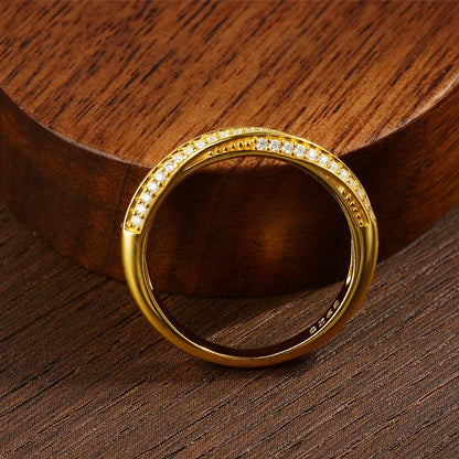 Slim silver ring featuring two parallel rows of small white stones, forming a subtle twist in the center, from the Bianco Nero collection.

