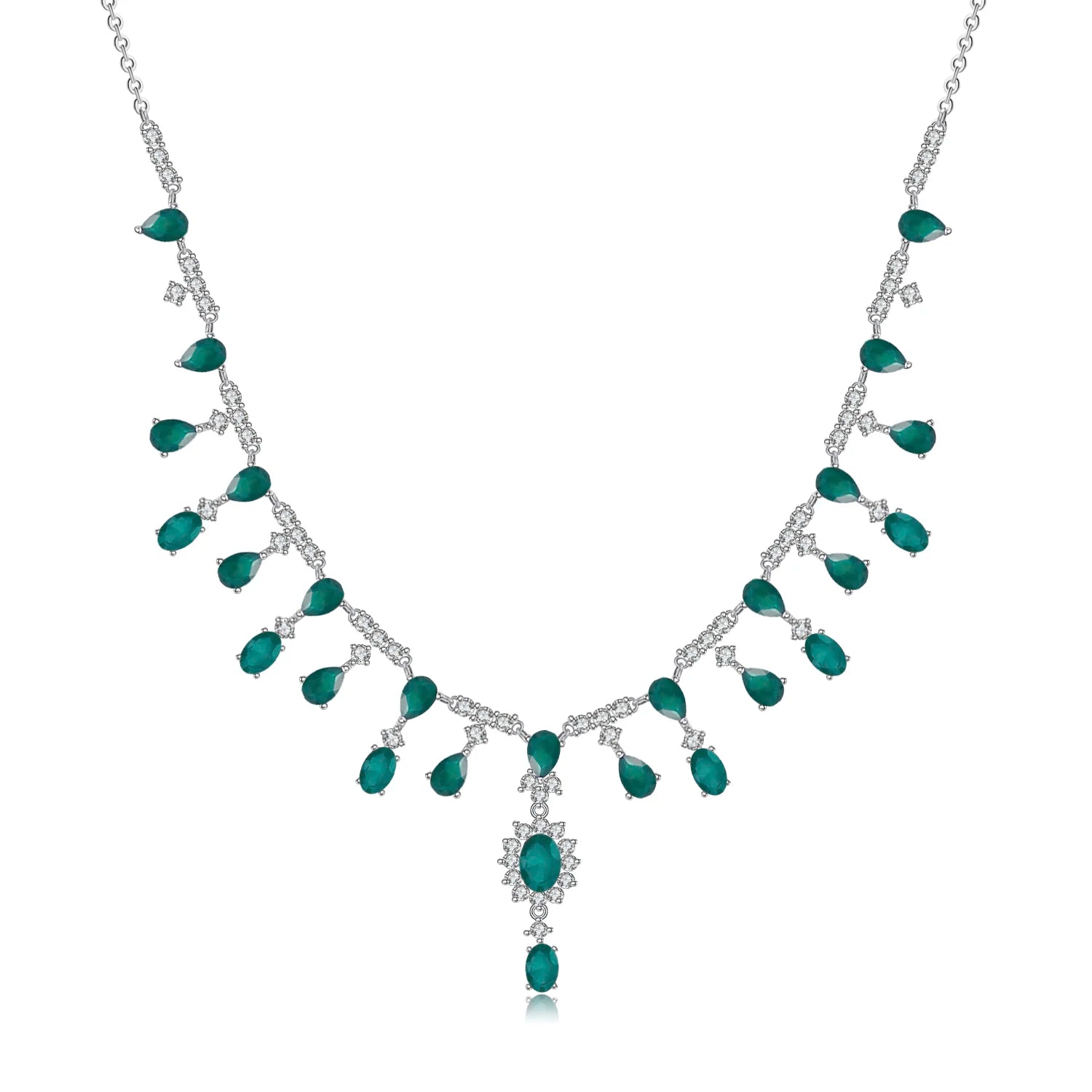 A silver necklace featuring green garnet stones set in an oval pattern with additional small white stones on a link chain.