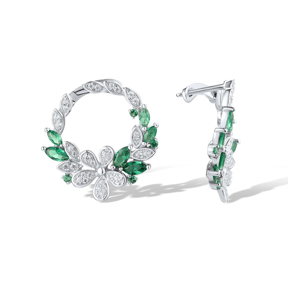 Silver and green gemstone hoop earrings with floral clover-inspired accents

