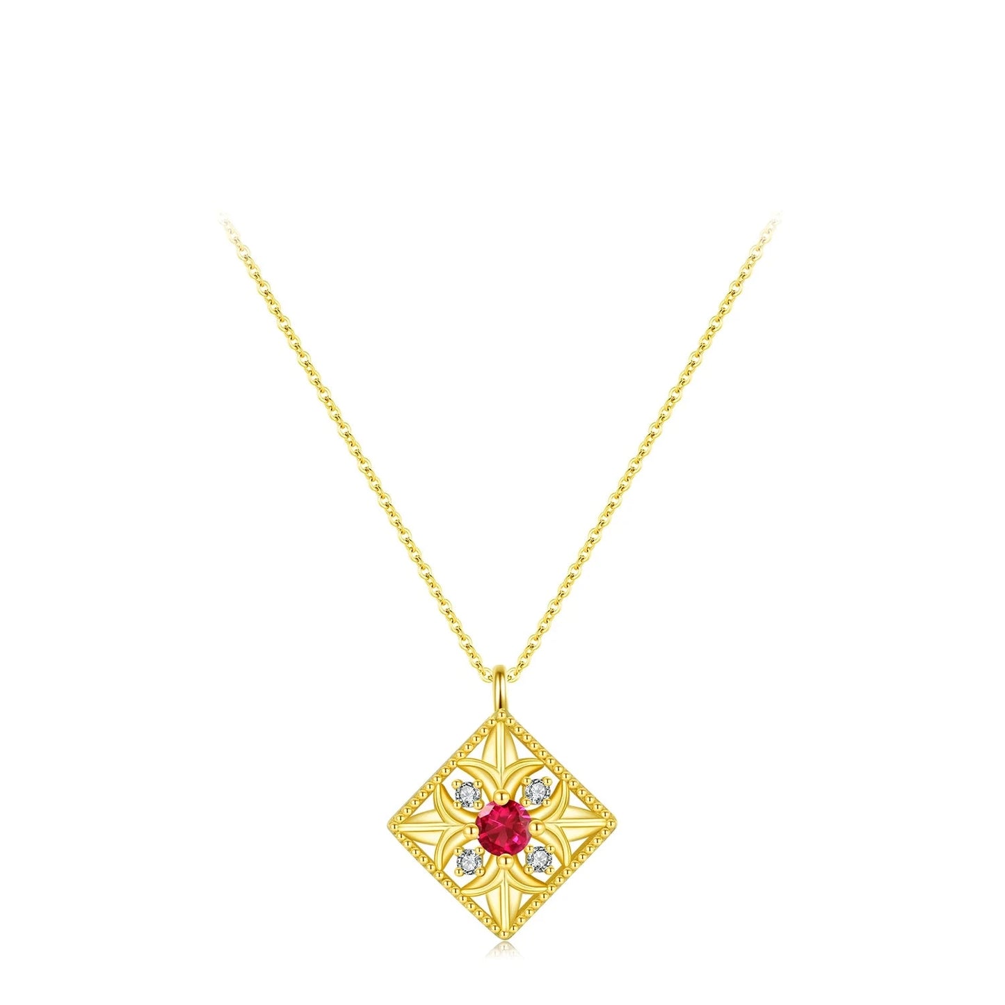 Gold-plated necklace with a ruby-red square stone and ornate vintage design

