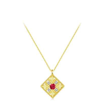Gold-plated necklace with a ruby-red square stone and ornate vintage design

