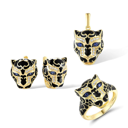 Occhi di Blu jewelry set featuring gold-tone leopard heads with sapphire blue eyes and black enamel detailing from the Bianco Nero collection.

