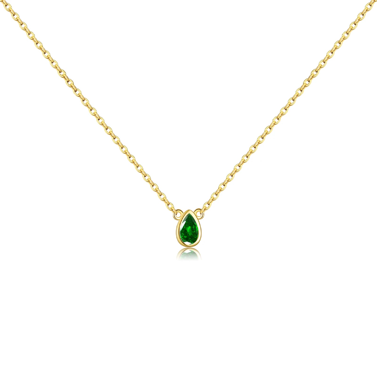 Delicate gold necklace featuring a teardrop-shaped green gemstone pendant.

