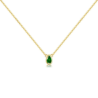 Delicate gold necklace featuring a teardrop-shaped green gemstone pendant.

