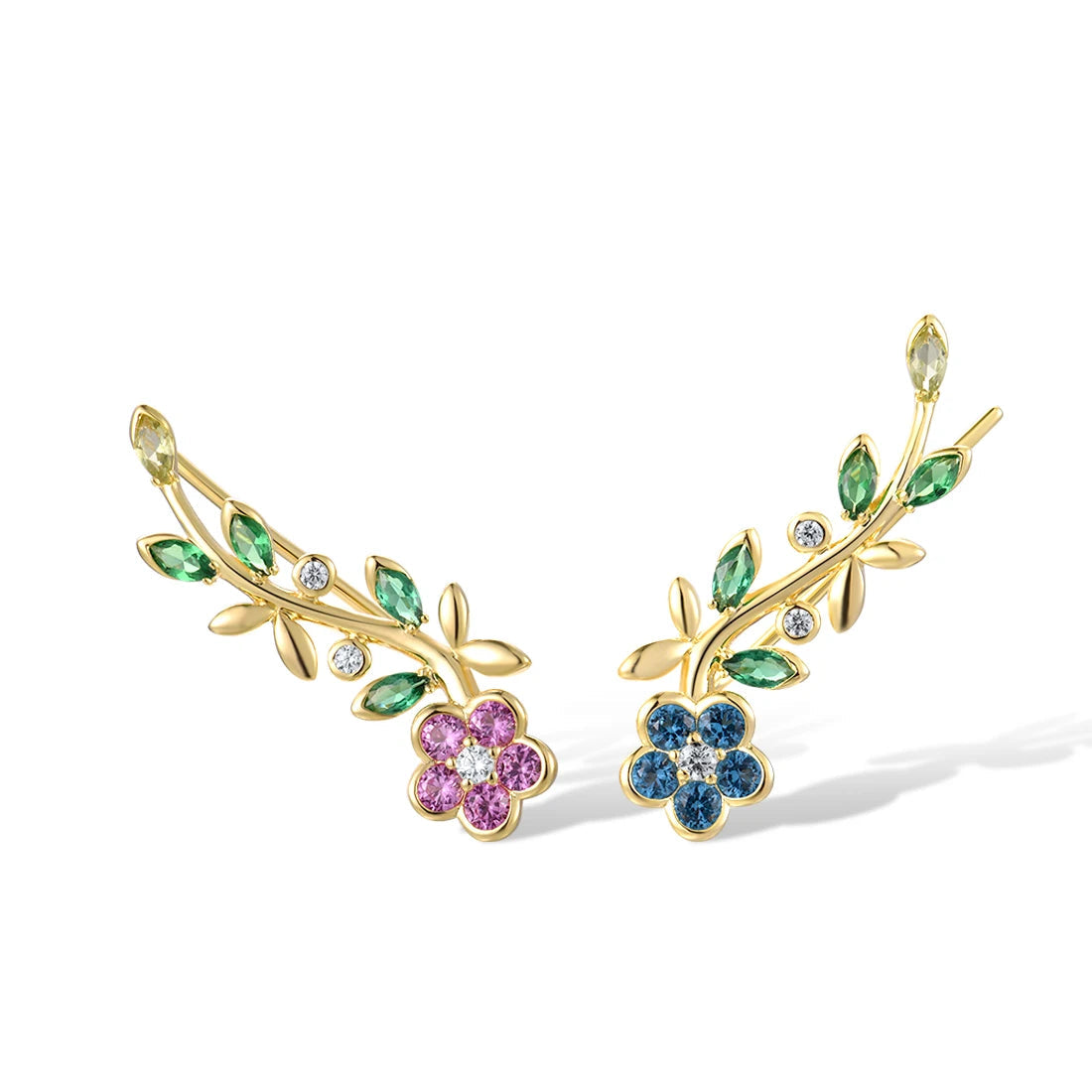 Asymmetrical gold earrings with colorful crystal flowers and green gemstone vines

