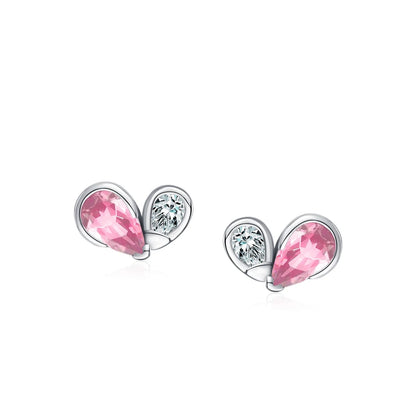 Delicate silver ring with a pink teardrop gemstone paired with a smaller clear round stone in a dual-stone open setting.

