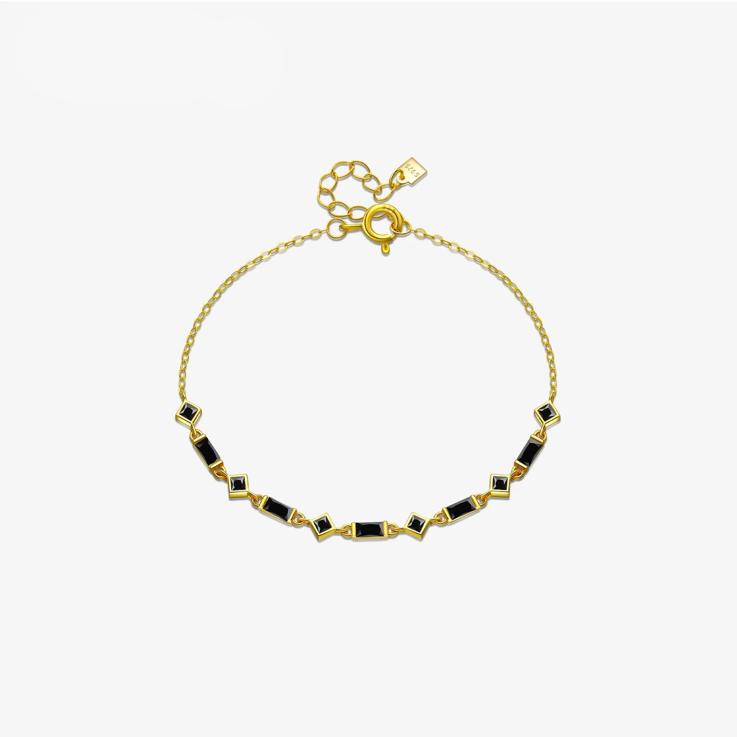 Silver bracelet with alternating square and rectangular black stones on a fine chain, from the Vindemia line.

