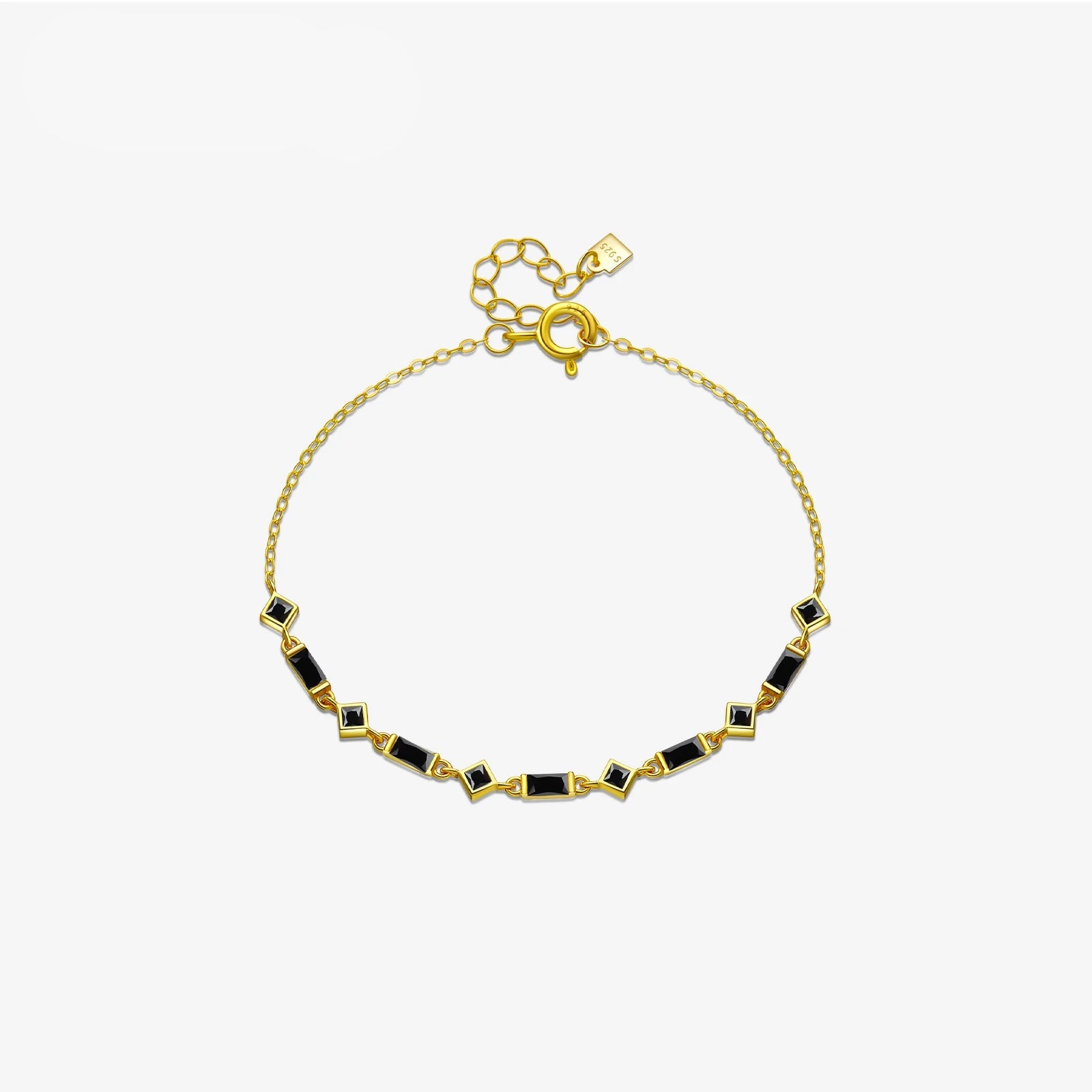 Silver bracelet with alternating square and rectangular black stones on a fine chain, from the Vindemia line.

