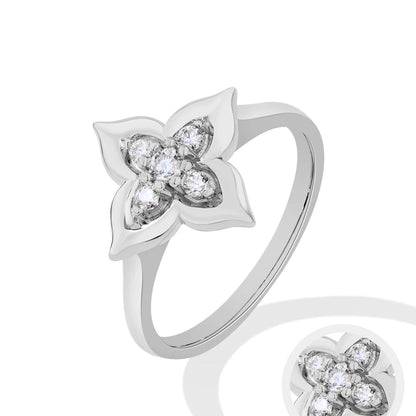 Moissanite floral ring in white gold and yellow gold plating, shown on hand and styled in various settings