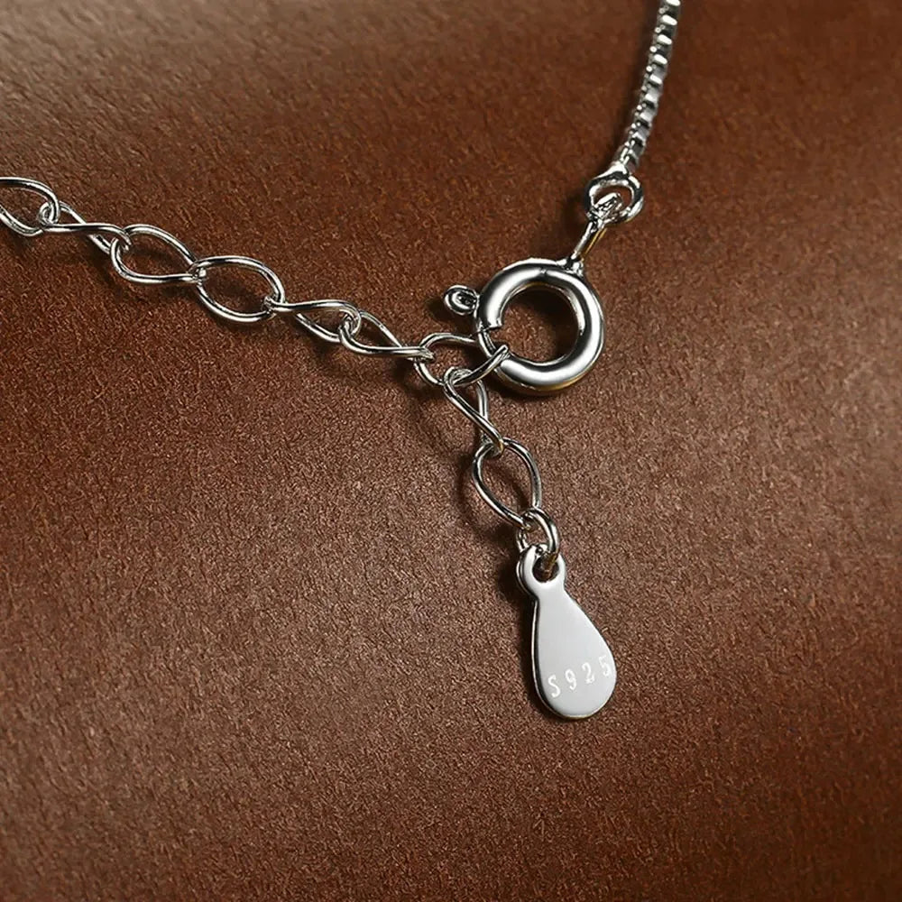 Silver chain necklace featuring a single marquise-cut white stone pendant, from the Bianco Nero collection.

