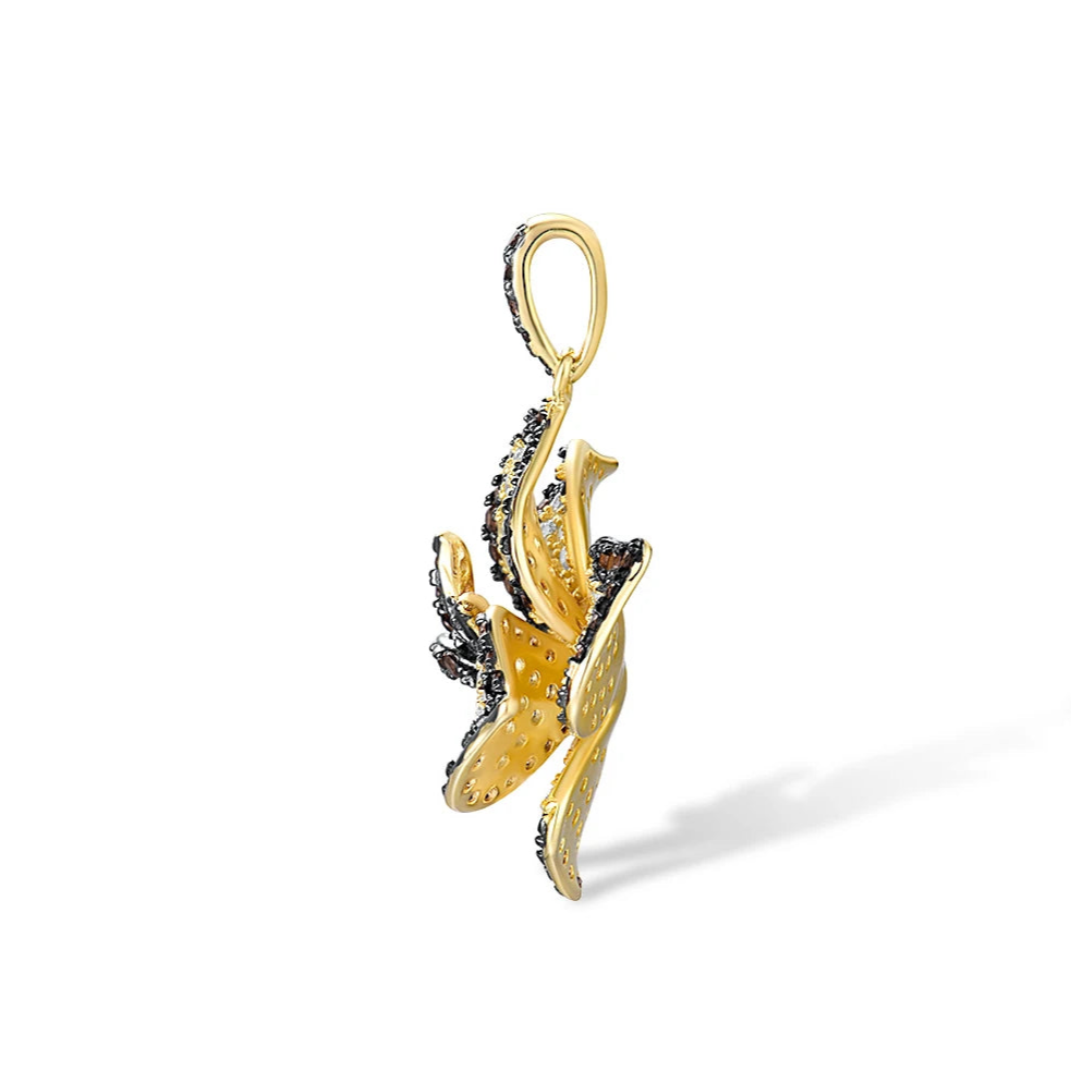 Pendant shaped like a layered flower with brown and white pavé stones on gold-toned metal


