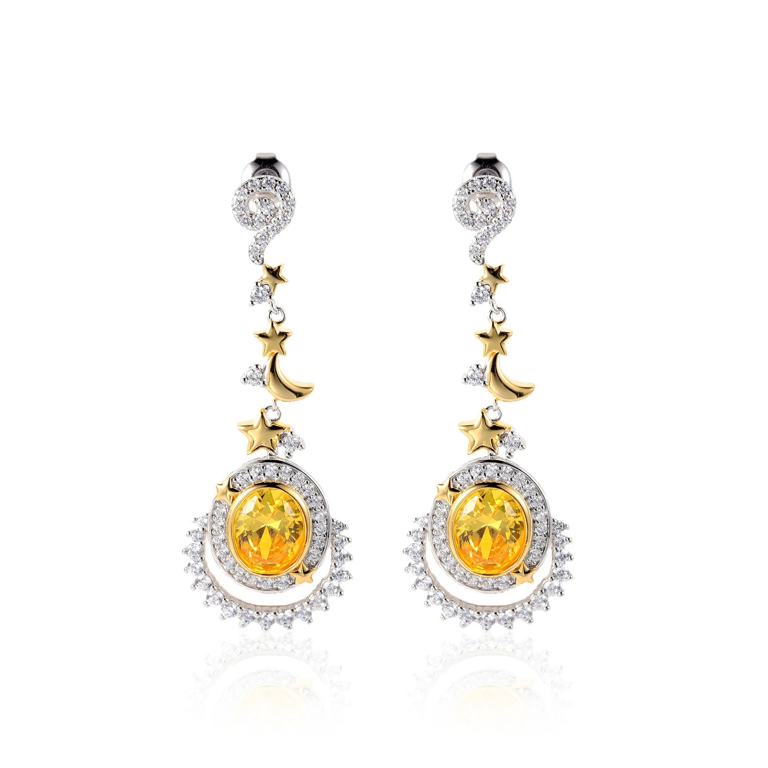 Dangling earrings with yellow gemstones, crescent moons, and star accents in gold and silver

