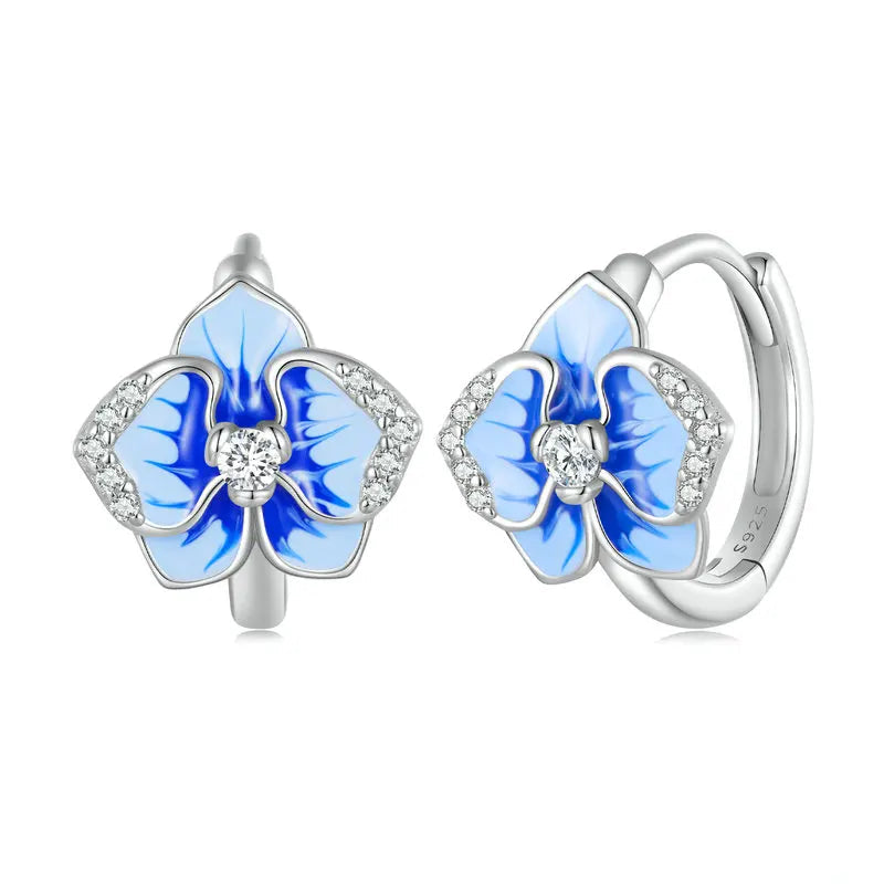 Sterling silver hoop earrings with blue enamel orchid flowers and crystal accents

