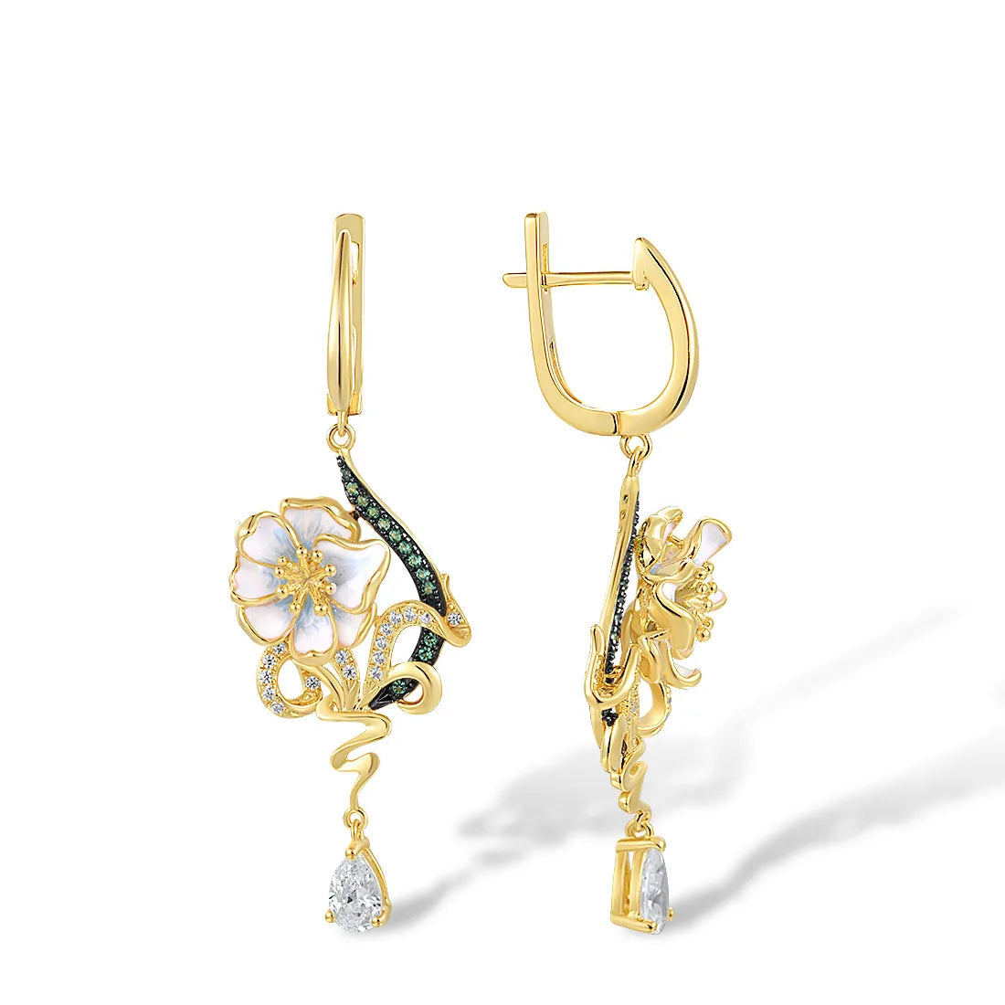 Nastro Verde jewelry set with green-accented gold-tone earrings and ring featuring delicate white flowers from the Verde collection.

