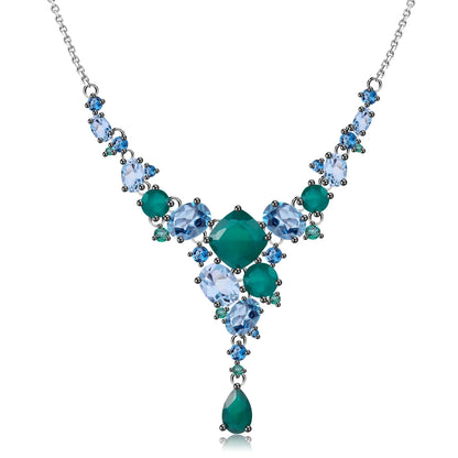 Necklace with gradient blue and green gemstones arranged in an organic cascading pattern

