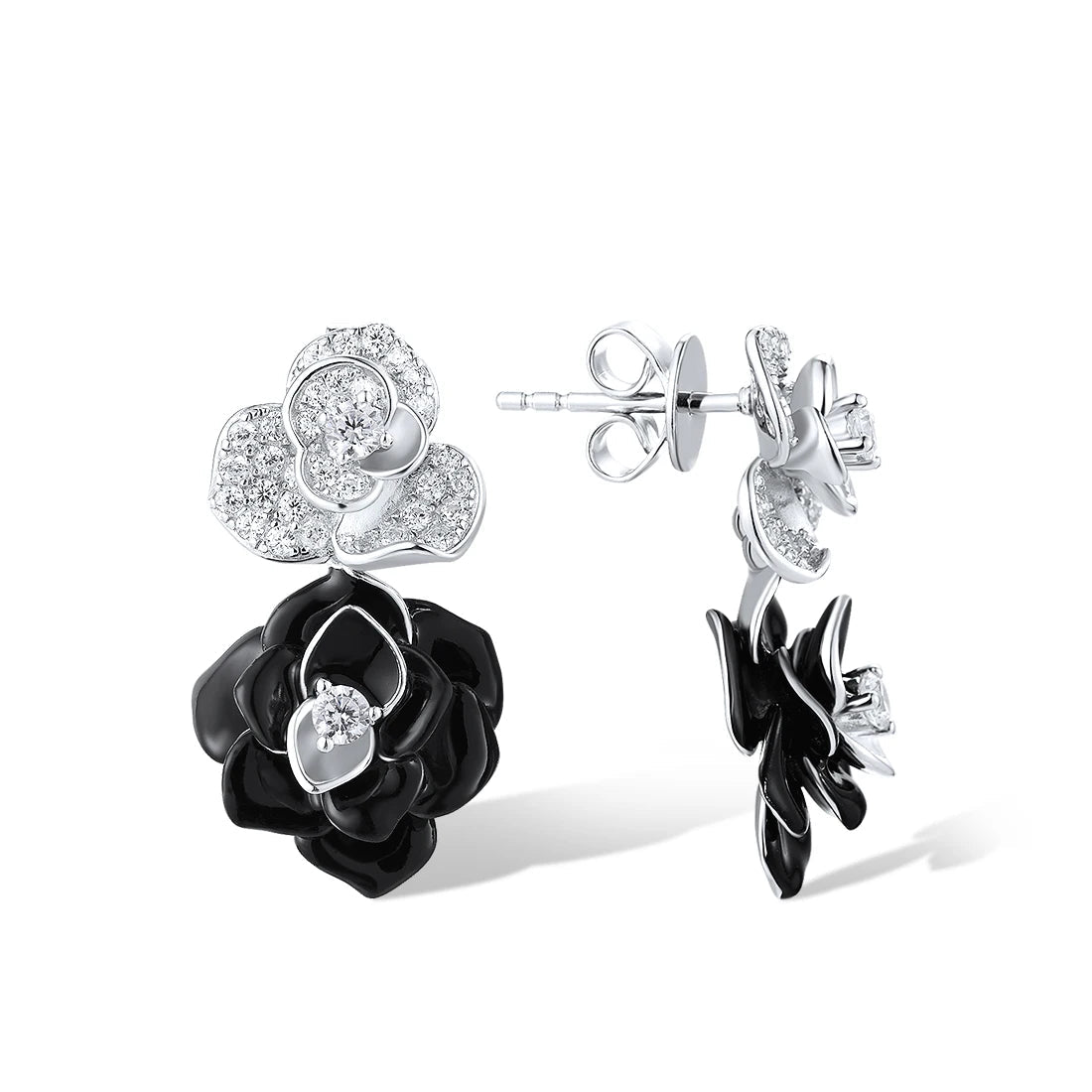 Silver and black enamel earrings shaped like layered roses with pavé accents


