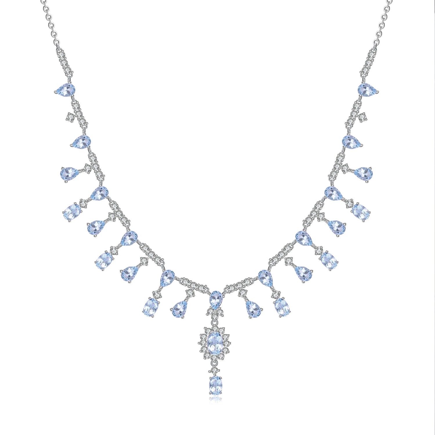 A silver necklace featuring green garnet stones set in an oval pattern with additional small white stones on a link chain.