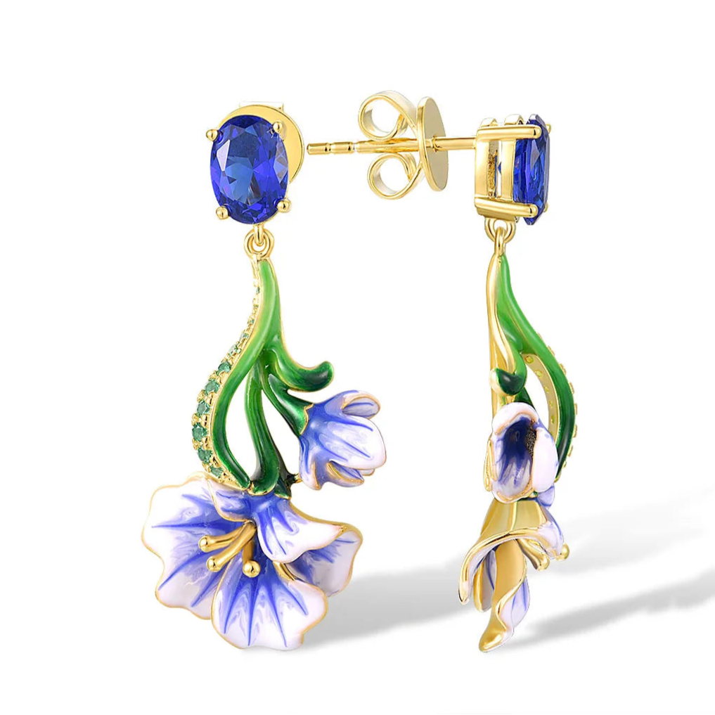 Gold-plated silver drop earrings with blue enamel Scilla flowers and oval sapphire-colored stones

