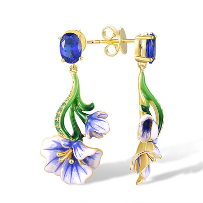 Gold-plated silver drop earrings with blue enamel Scilla flowers and oval sapphire-colored stones

