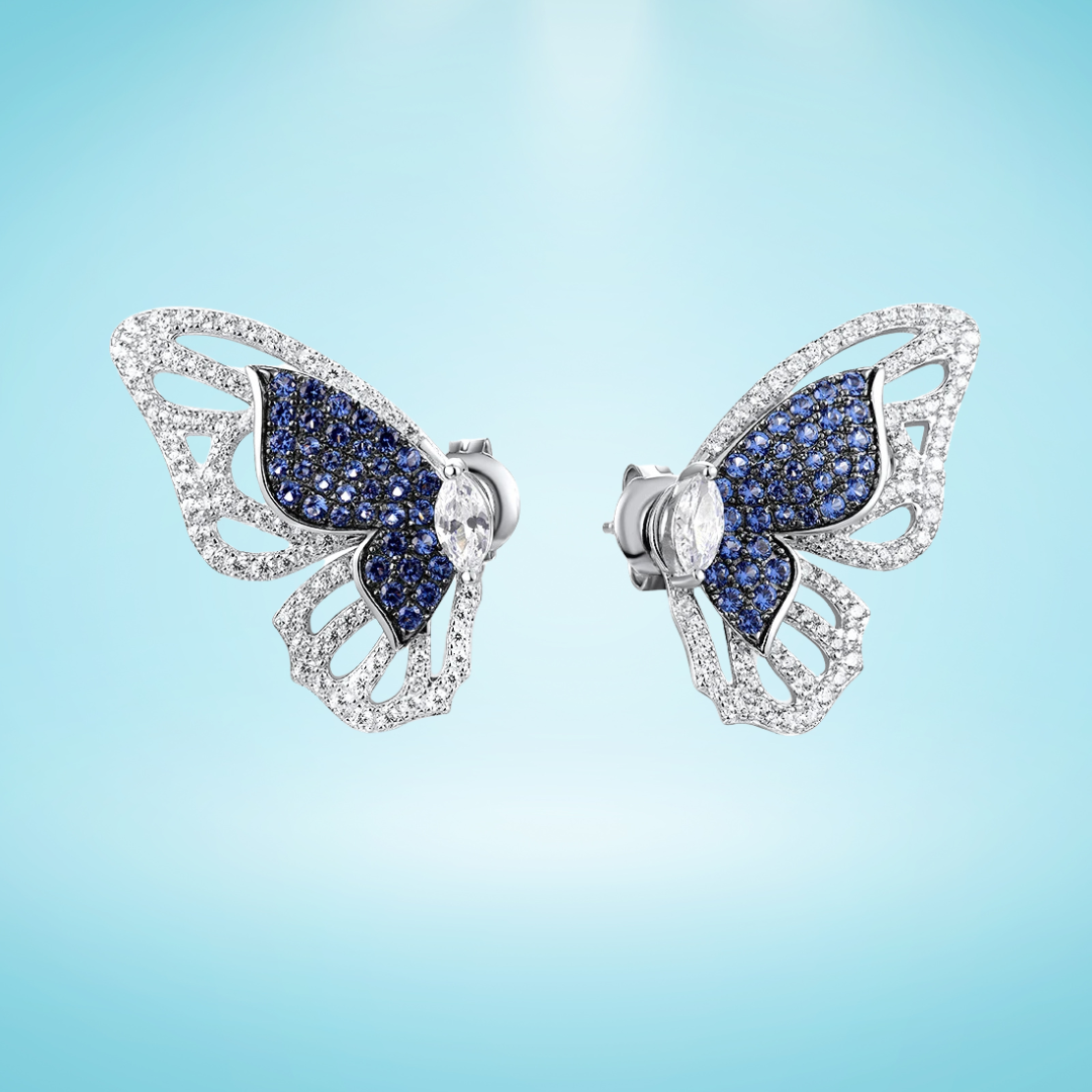 Sterling silver butterfly stud earrings with blue and white gemstones

