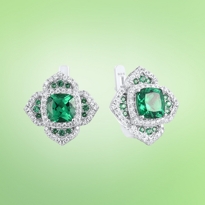 Cushion-cut green gemstone earrings with layered silver and green pavé accents

