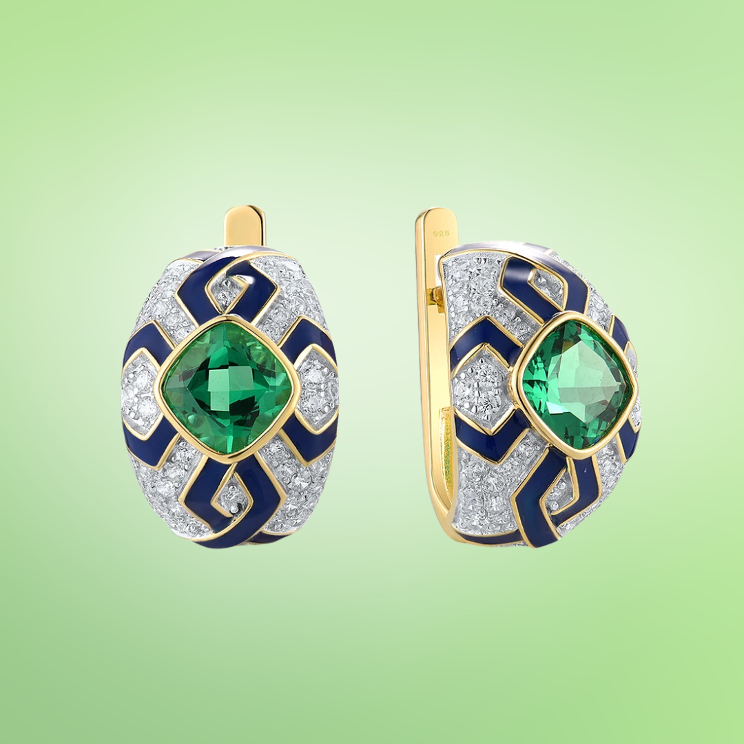 Gold and silver oval earrings with green cushion-cut stones, navy enamel, and geometric patterns

